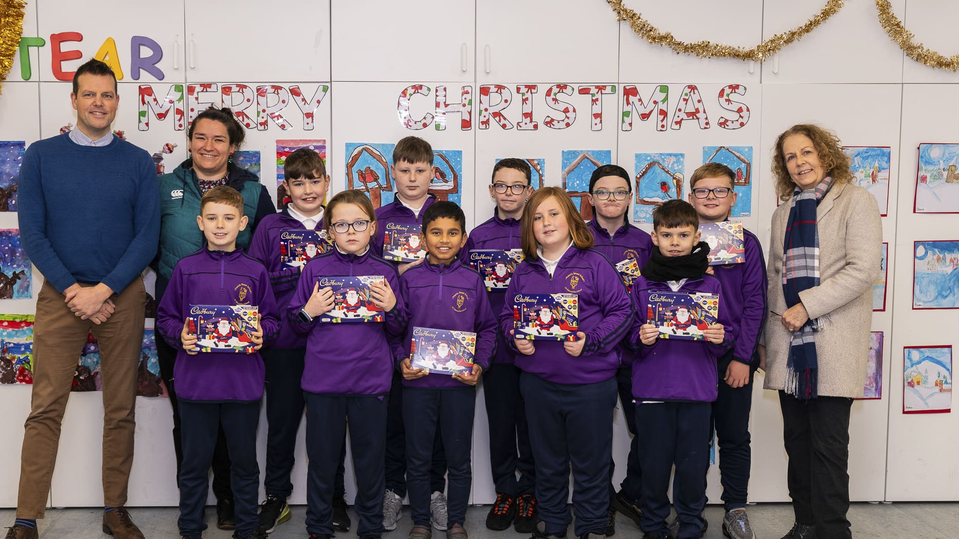 Photo of DBFL staff supporting local communities with selection boxes