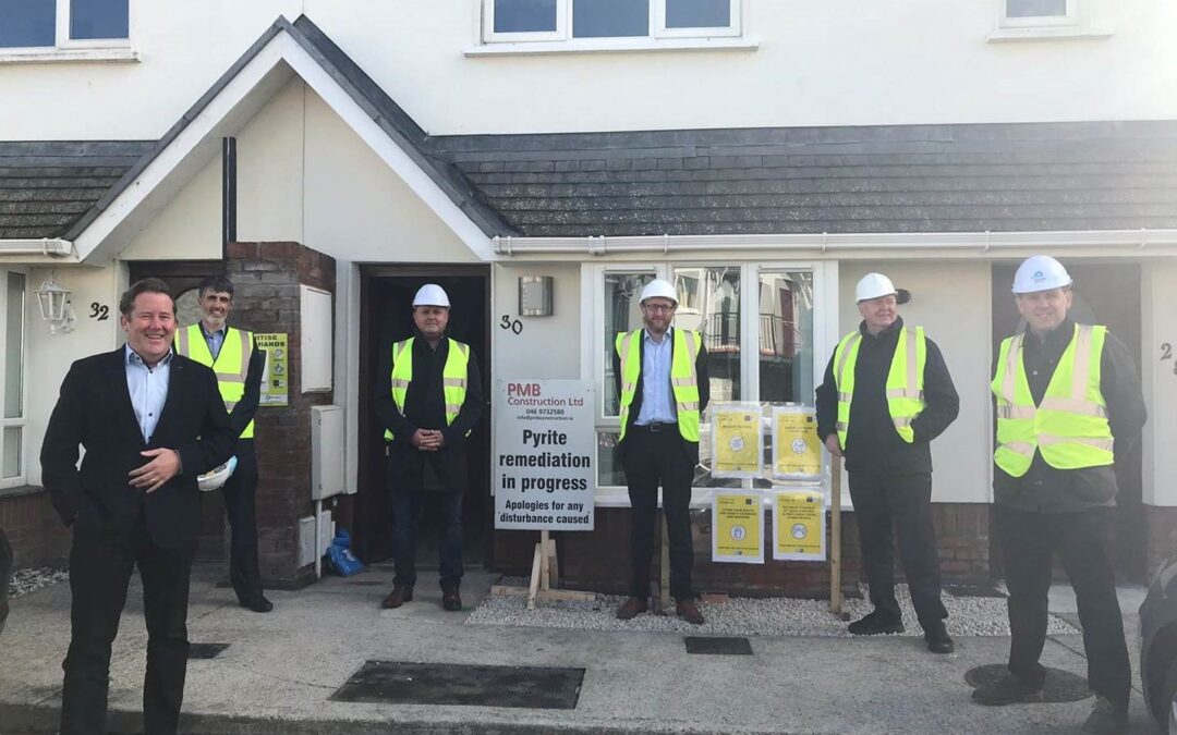 Darragh O’Brien, handed over the keys to the 2000th remediated house completed